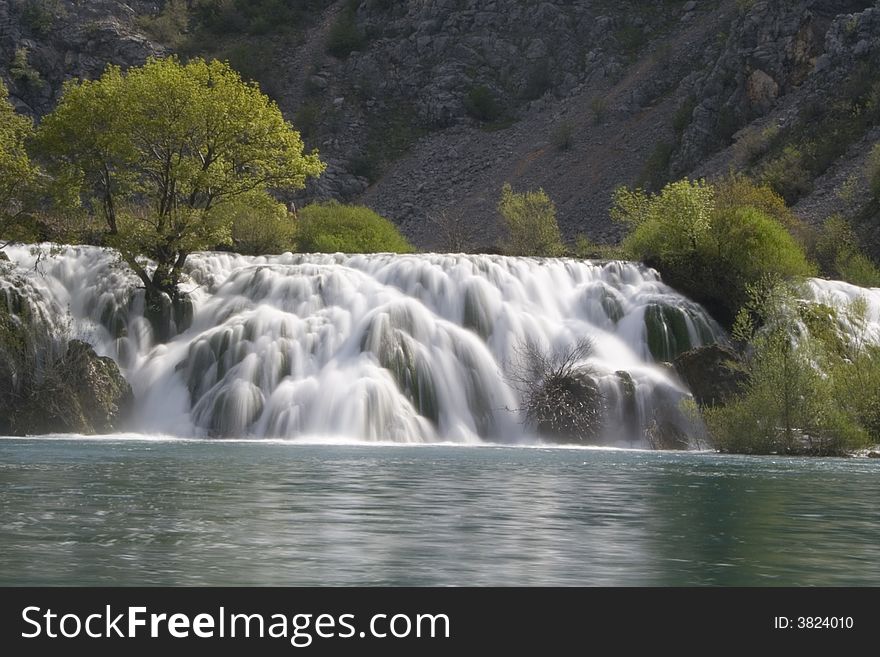 Beautiful waterfall with tree in it. Beautiful waterfall with tree in it