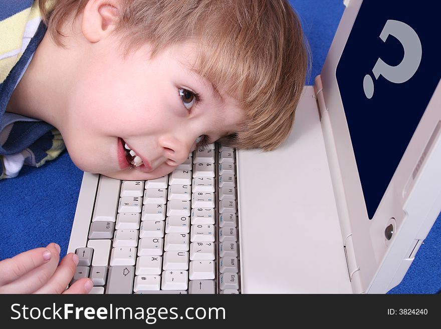 Young boy using a laptop