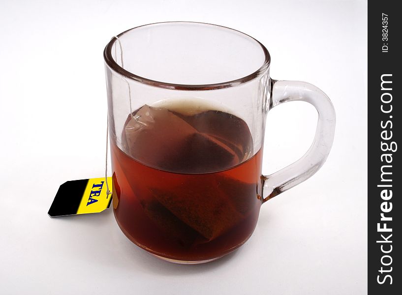 A cup of hot tea isolated on a white background