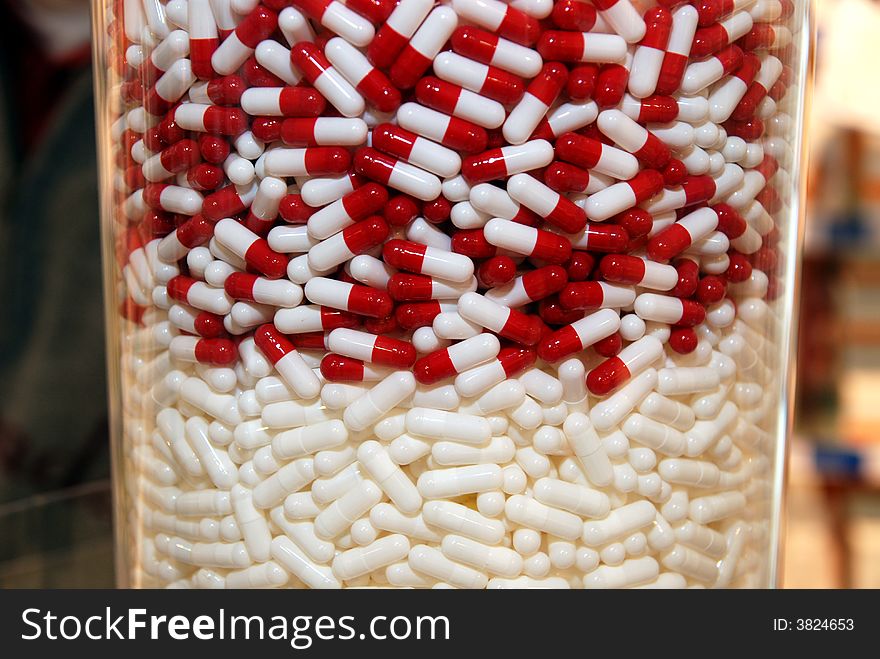 Background of white and red drugs. Background of white and red drugs