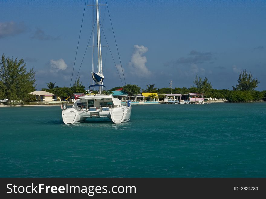 A catamaran anchored off Anegada Island in the British Virgin Islands BVI. A catamaran anchored off Anegada Island in the British Virgin Islands BVI