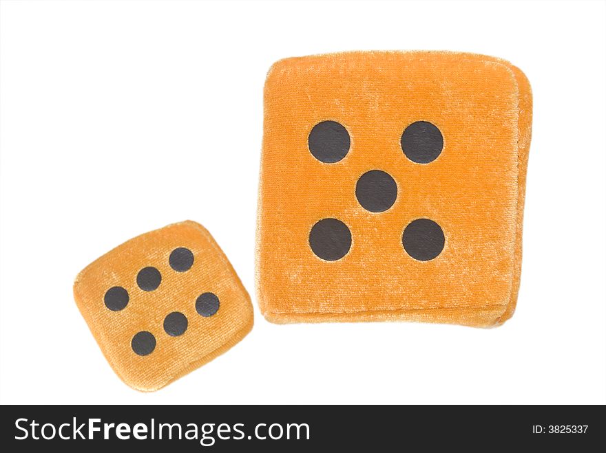 Orange Stuffed toy dice on white background