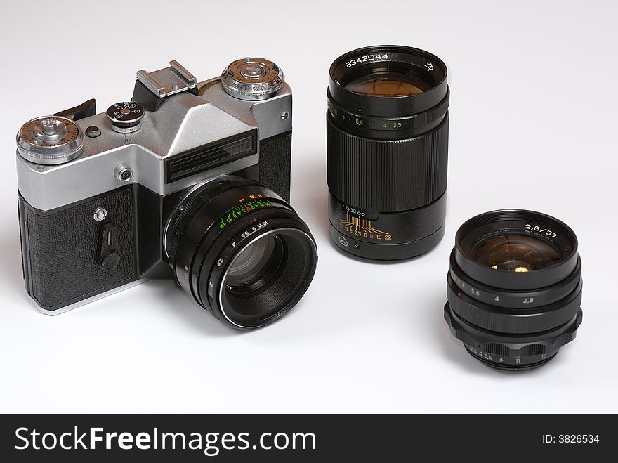 Old soviet 35mm film camera with normal, wide and tele lenses. Old soviet 35mm film camera with normal, wide and tele lenses