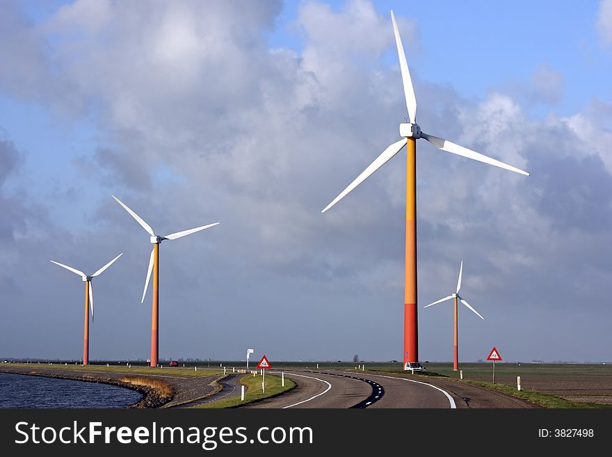 Windturbines at the IJsselmeer in the Netherlands. Windturbines at the IJsselmeer in the Netherlands