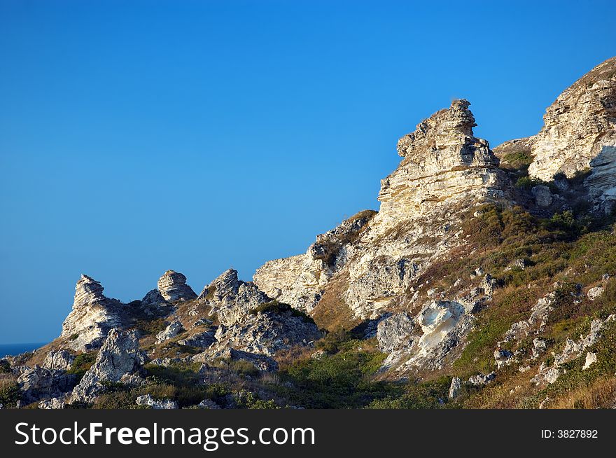 Surreal rock peaks on the sea coast. copy space. Terhankut, Crimea. Surreal rock peaks on the sea coast. copy space. Terhankut, Crimea.