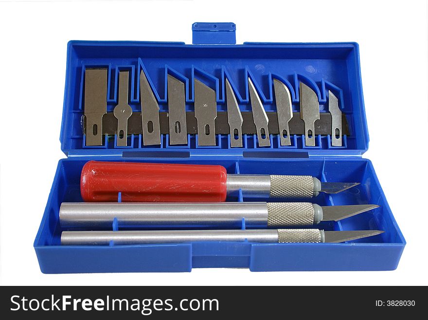 Cutter with blades in a blue box, isolated. Cutter with blades in a blue box, isolated.