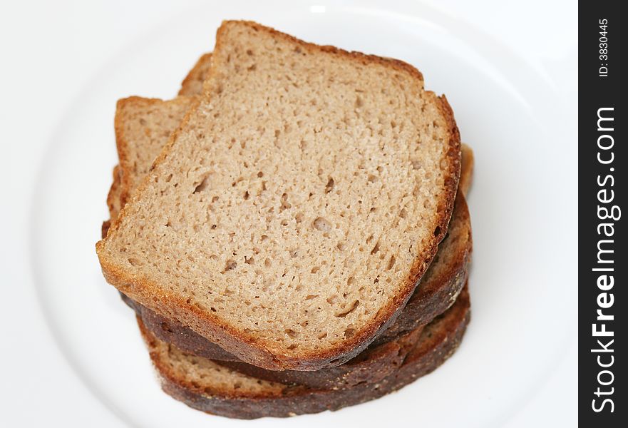 Pieces of bread on the white background