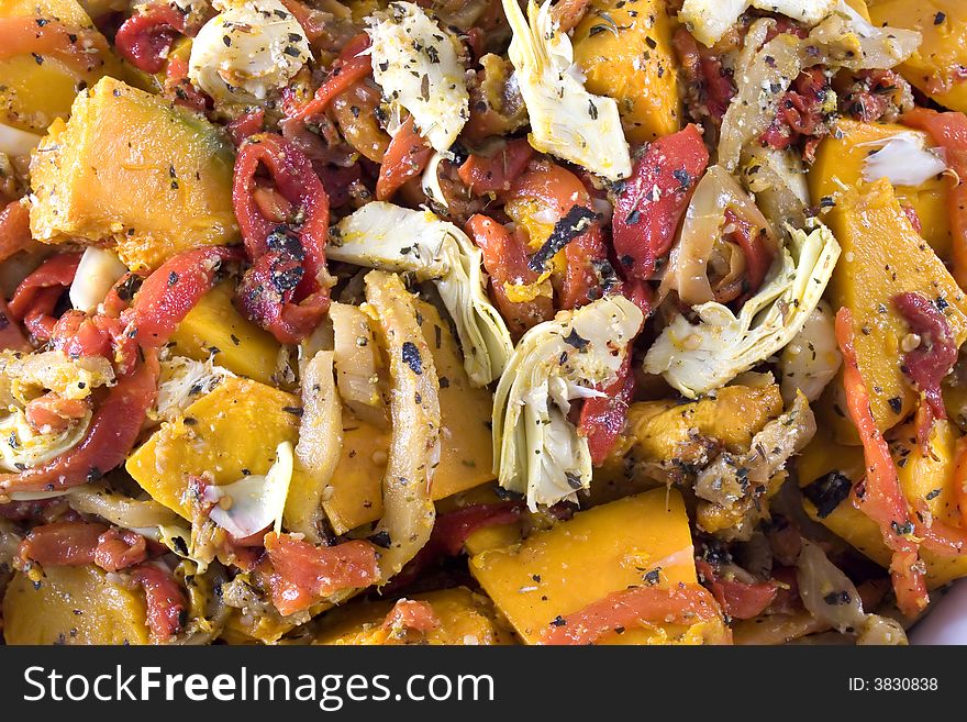Gourmet salad dish of roasted red peppers, pumpkin, artichokes and eggplant, topped with herbed crumbs. Gourmet salad dish of roasted red peppers, pumpkin, artichokes and eggplant, topped with herbed crumbs