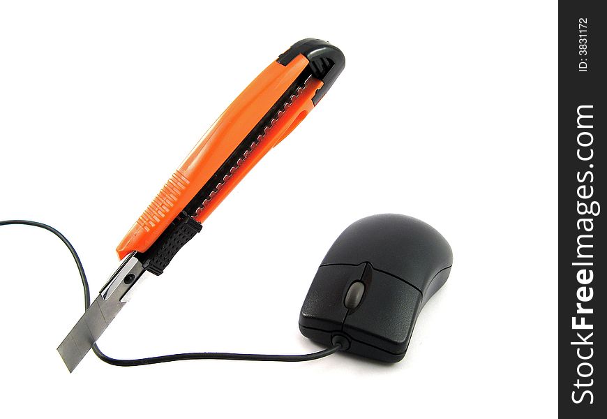 Computer mouse cut off with knife. Computer mouse cut off with knife