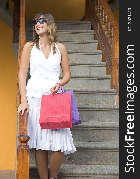 Beautiful girl with shopping bags