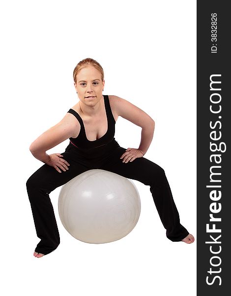 Sitting on exercise ball rolling the shoulders forward. Sitting on exercise ball rolling the shoulders forward