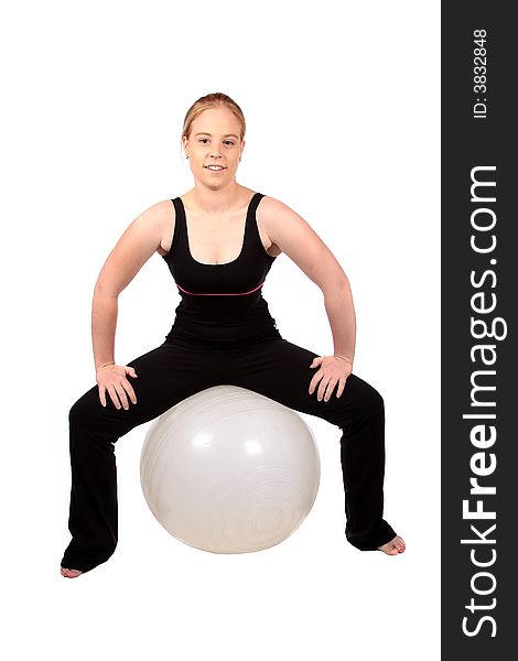 Balancing on a flex ball to strengthen the muscles