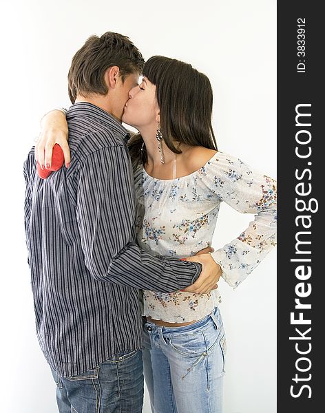 Girl kissing her boyfriend in the cheek