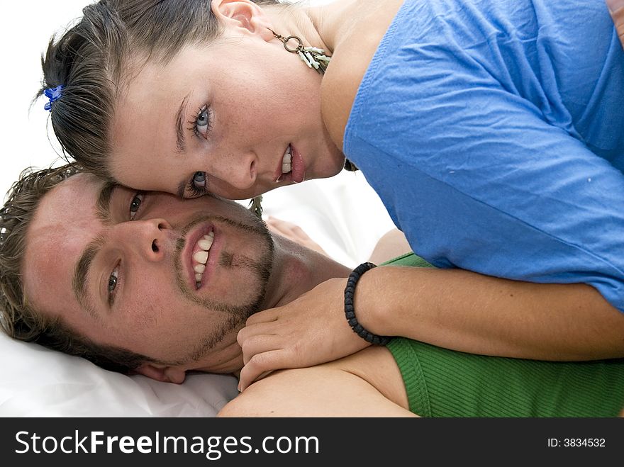 Girl and a guy lying in the bed
