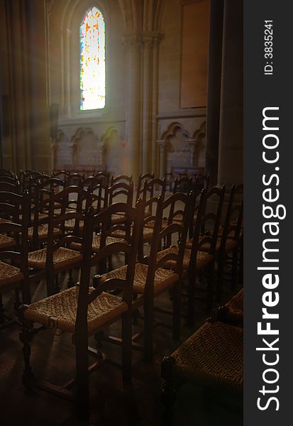 Rays of light through stained glass in a church