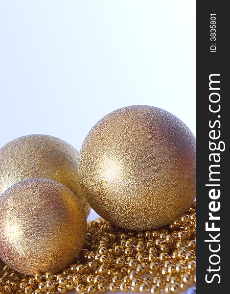 Gold Christmas balls and pearl