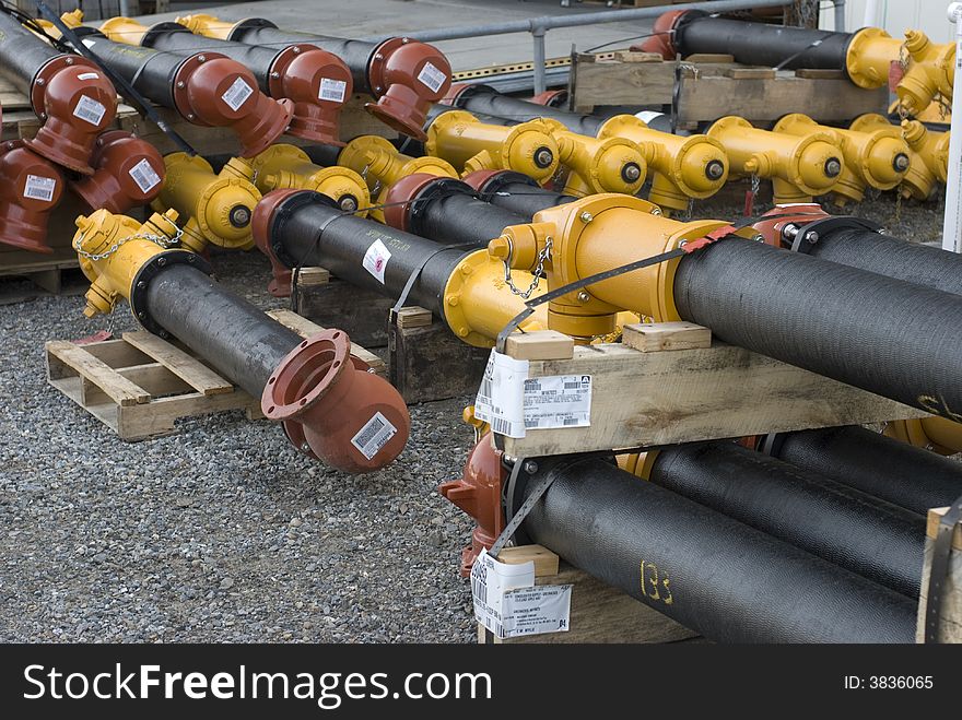 Stacks of industrial fire hydrants. Stacks of industrial fire hydrants.