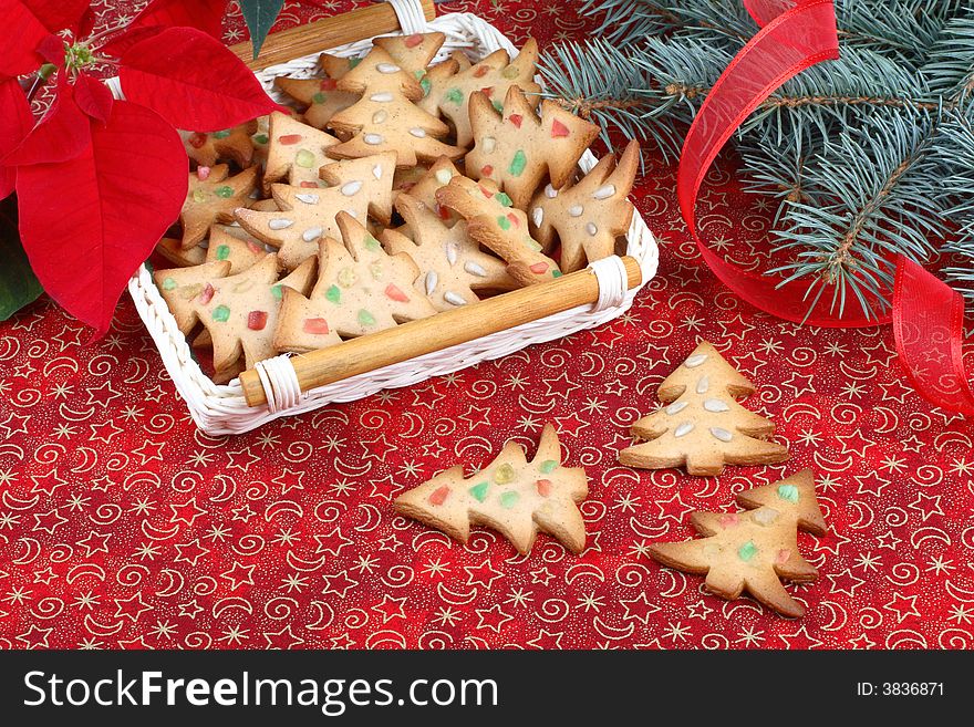 Christmas still life with cookies, pine and ribbon