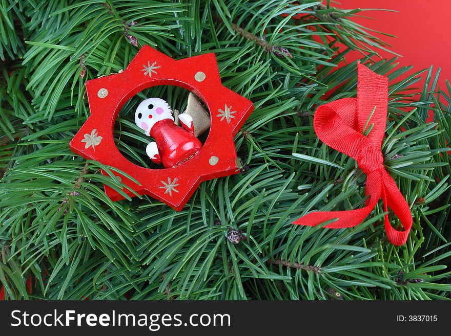 Detail of advent wreath- red decoration, red ribbon. Detail of advent wreath- red decoration, red ribbon