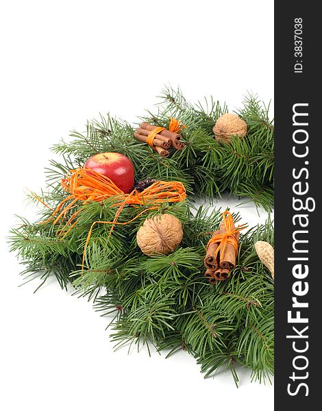 Advent wreath with nuts, cinnamon, apple