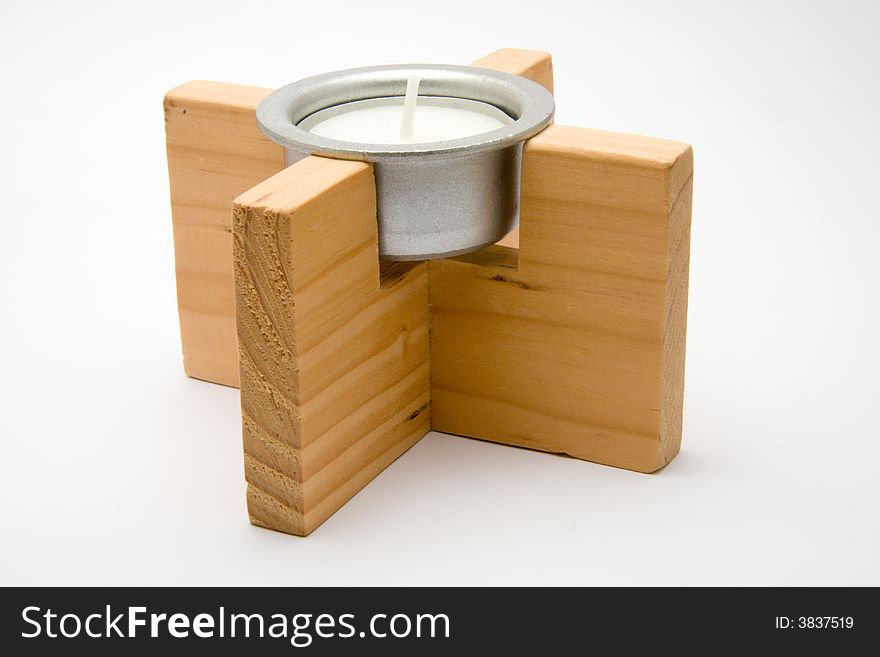 Closeup of a candle on a white background not burning