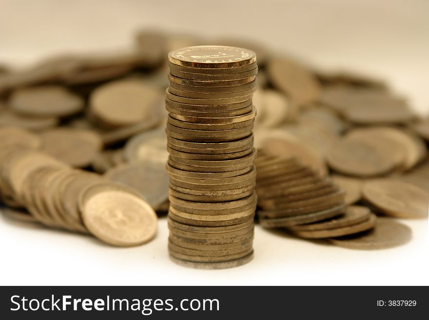 Stack of coins on a white background