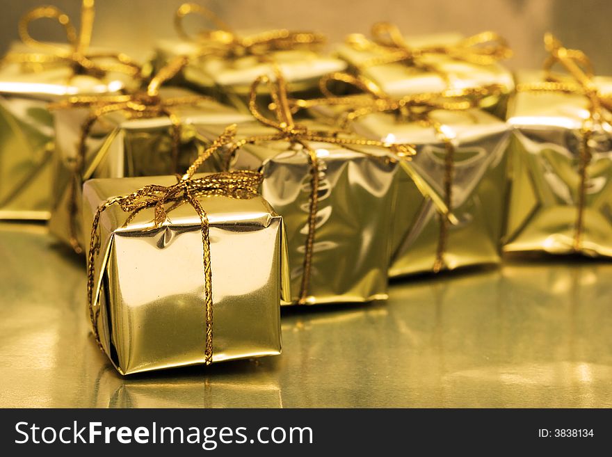 Stack Of Golden Gift Boxes