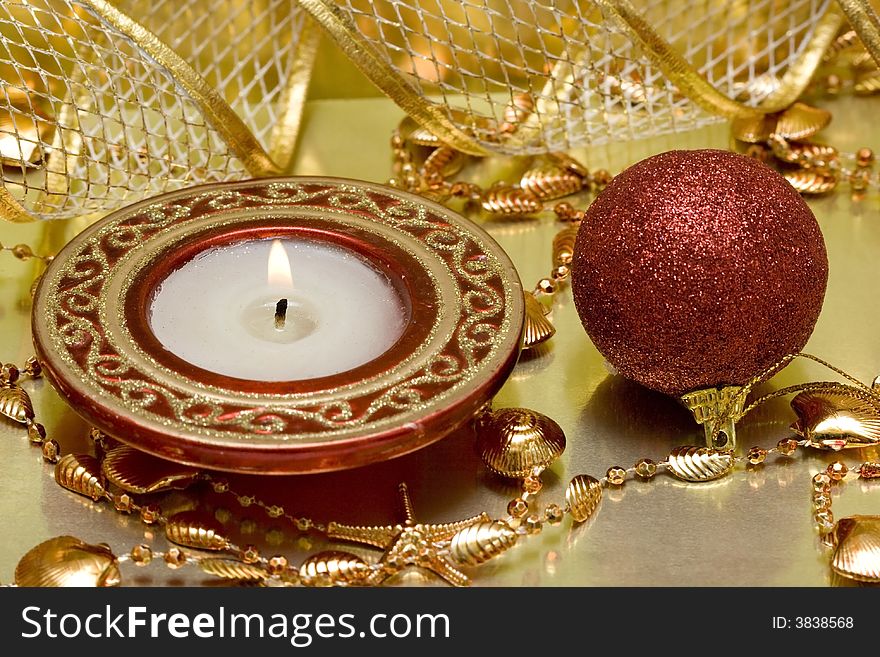 Festive new-year candle and Christmas ball