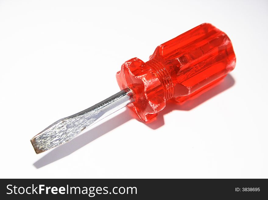 Red handle screwdriver isolated on white background.