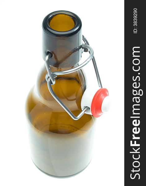 Glass beer bottle on white background