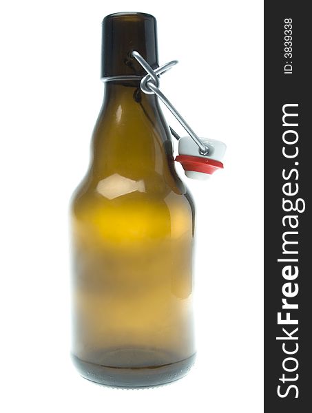 Glass beer bottle on white background