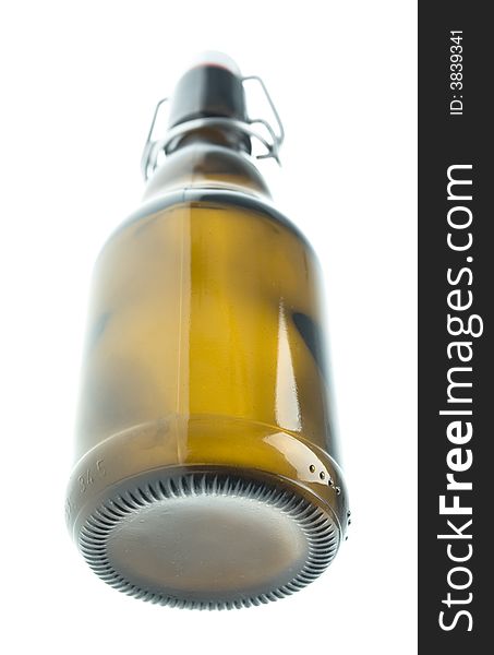 Glass beer bottle on white background