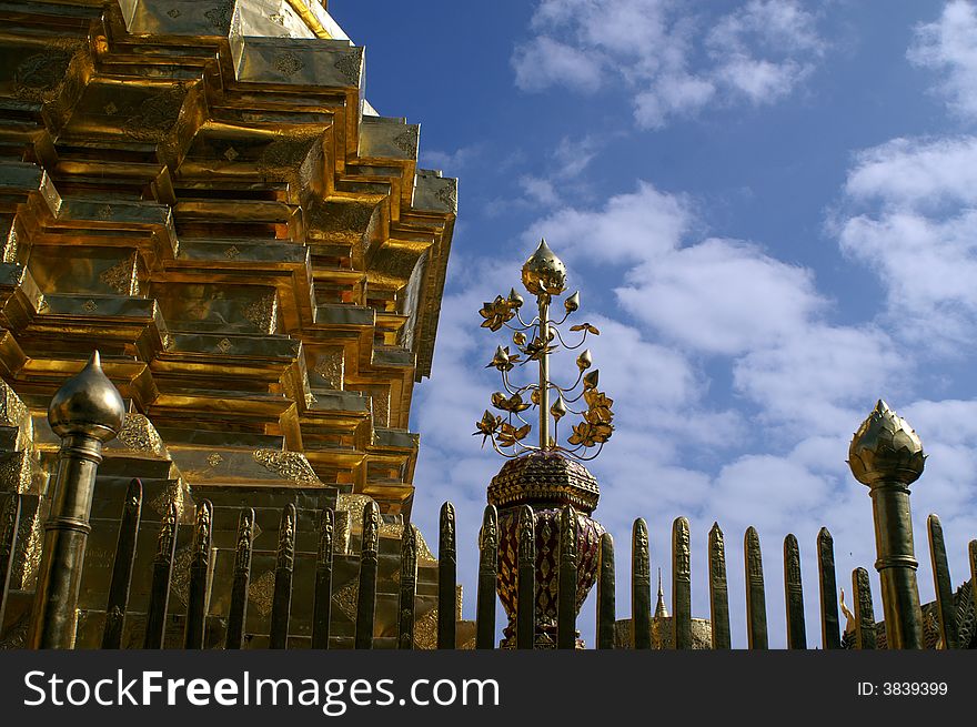 Golden pagoda and blue sky. Golden pagoda and blue sky