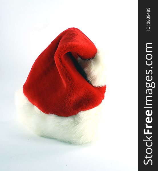 Santa's red cap isolated on white