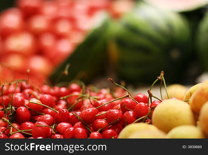 Red cherry and yellow pears, watermelons. Red cherry and yellow pears, watermelons