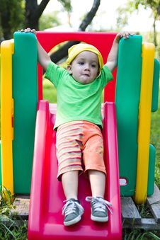 Child On Slide Stock Photo Child On Slide Stock Photo