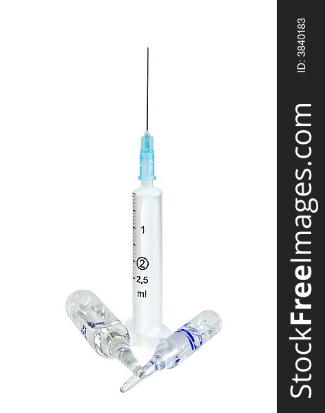 The syringe and two ampoules are photographed on a white background