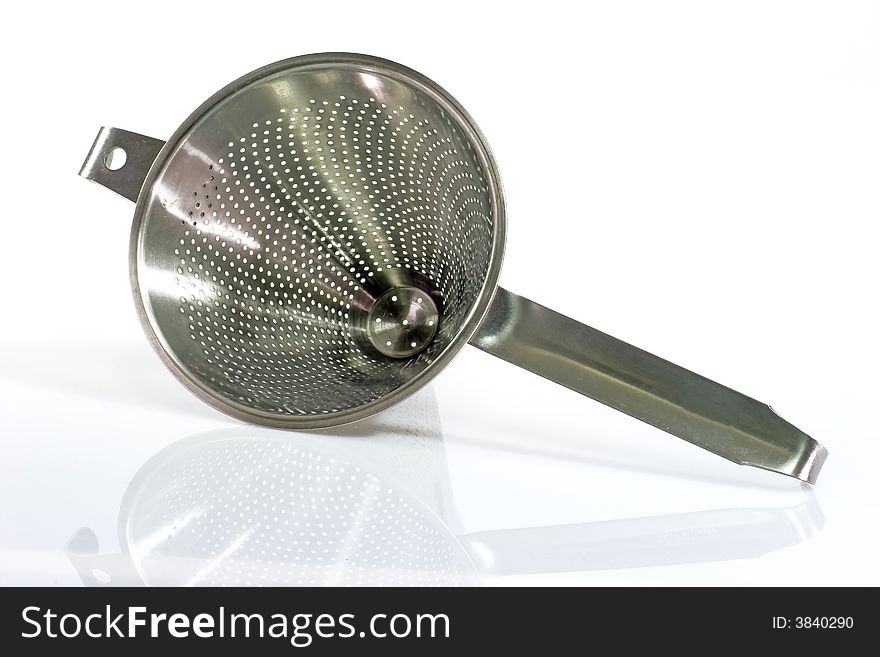 Silver sieve on bright background. Silver sieve on bright background