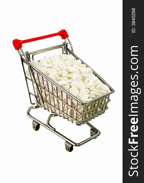 White pills in a trolley isolated on white background. White pills in a trolley isolated on white background