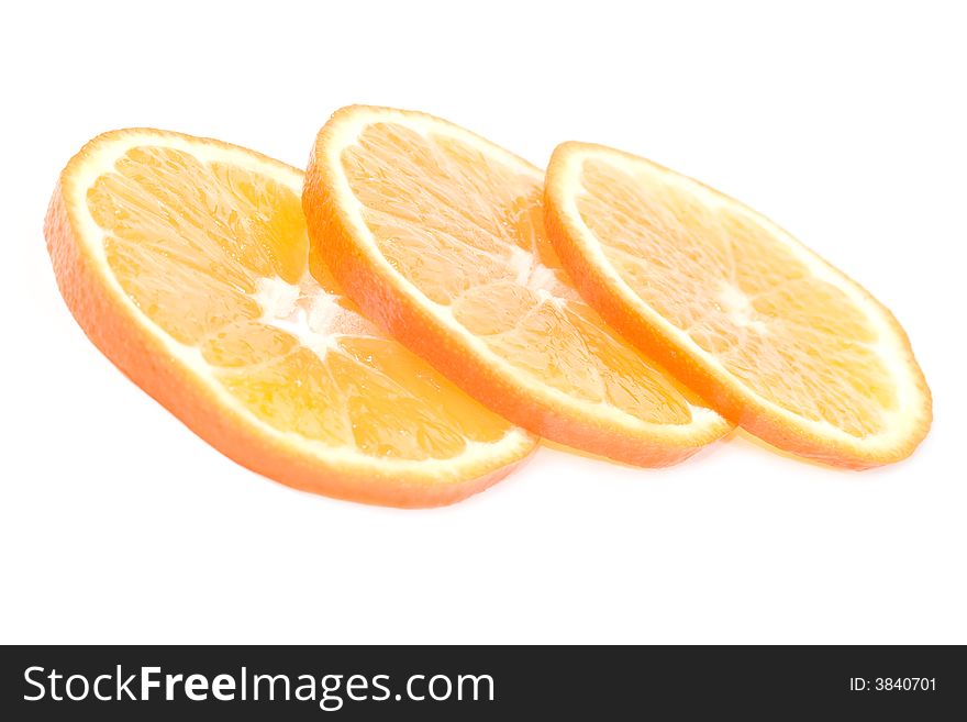 Three part of oranges over the white