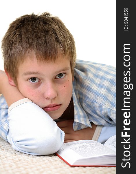 Young Boy Learning On The Floor