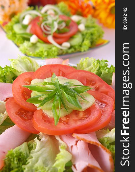 Fresh salad with onion, tomato, basil and cucumber. Fresh salad with onion, tomato, basil and cucumber