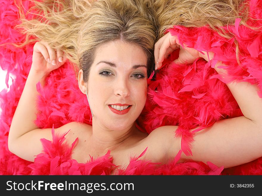 Gorgeous Blonde Laying In Pink Feathers