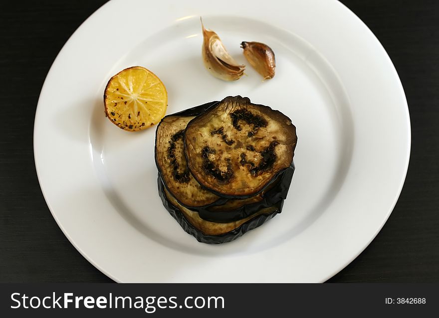 Healthy roasted eggplant with garlic and lemon