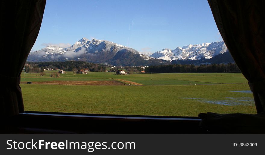 Look the swiss Alps in a train. Look the swiss Alps in a train