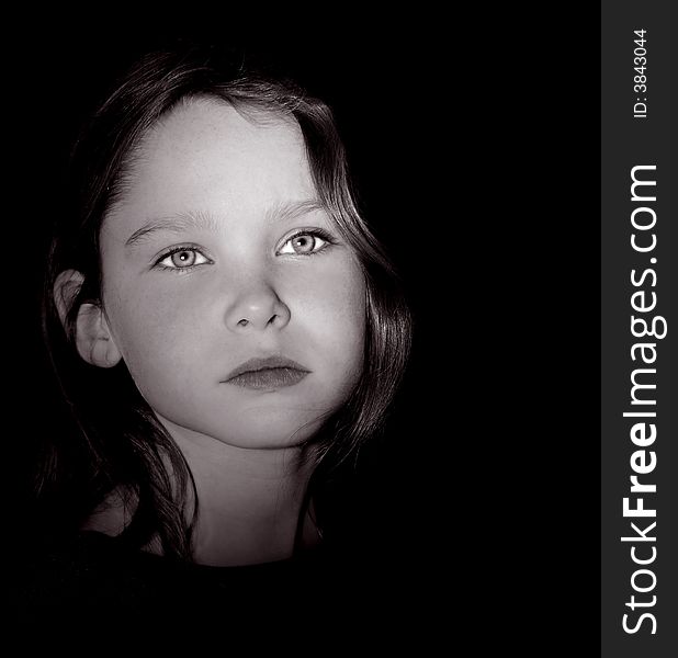 Portrait of a young beautiful girl on Black. Portrait of a young beautiful girl on Black