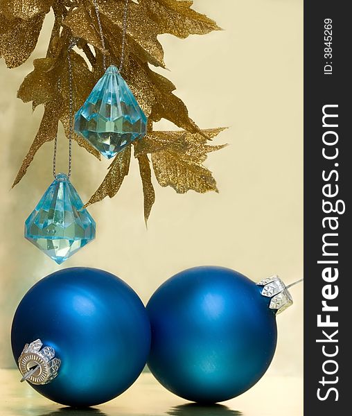 Blue Christmas balls and golden tree