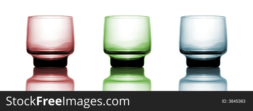 Red, green and blue glass isolated over white background, with reflection. Red, green and blue glass isolated over white background, with reflection