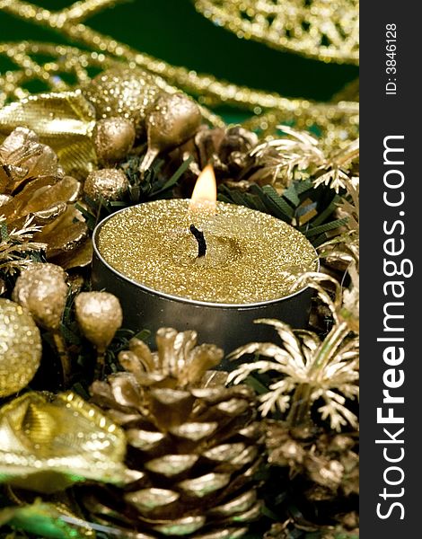 Golden candle and celebration decoration