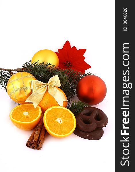 Christmas balls and orange on a white background